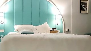 Cute amateur asian web cam girl playing with her toy