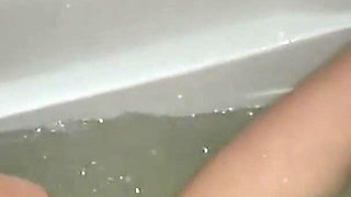 Brunette Babe Fingers Wet Pussy to Explosive Orgasm in Tub