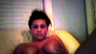 chubby with huge boobs masturbating in front of webcam