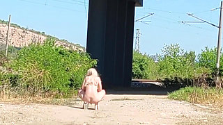Slave Tih Shows Her Pussy and Tits Under the Bridge