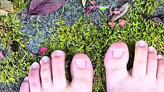 Brunette with foot fetish rubs big dick with her feet in POV