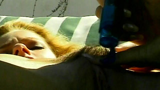 Petite blonde lesbians having fun by the pool