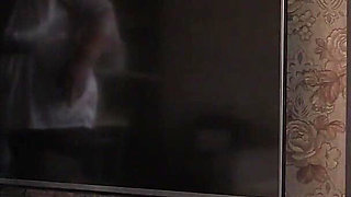 A Mature Wife with a Big Ass in White Panties in Everyday Life, Behind the Scenes. a Home Camera Watches This Plump MILF.