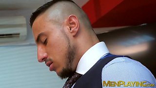 Men in suits enjoy a rough session of steamy sex at work