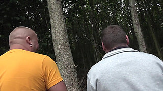 Blonde sucks two cocks then gets fucked to cumshot in the bushes