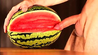 Muscular Stud Fucks and Cums on Watermelon