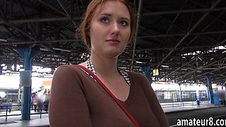 Redhead Eurobabe flashes her big tits in bus station