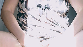 Horny mature squats, spreads and fingers her gaping cunt