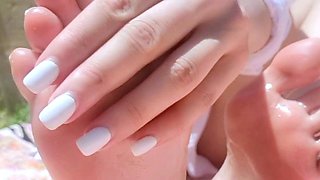 Sexy leggy brunette enjoys foot fetish