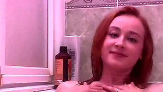 Redhead Play with Her Wet Pussy in Bathtub