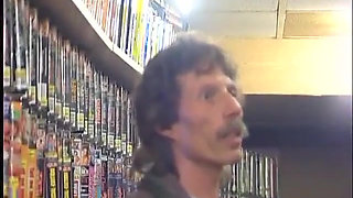 Amazing brunette slut gives him nice blowjob in video club