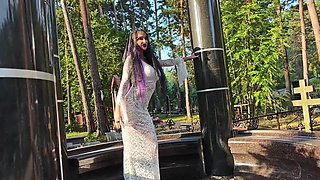 Gothic Witch Wanders the Cemetery, Performs Black Magic Rituals, and Makes You to Worship Her and Satan.