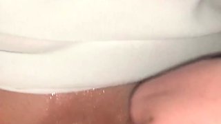 Beautiful mature blond sexbomb with glasses masturbates