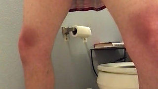 Gay sissy showing off his sissy clit in the bathroom