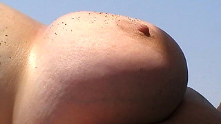 Julie Cunningham  BIG TITS outside nude on a public beach