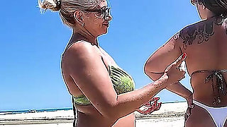 Talking Nonsense and Exfoliating on the Beach with Friend Dai Belan