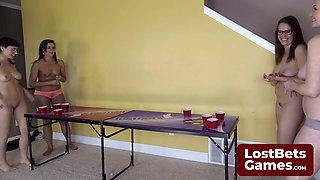 Four hot lesbians playing a Strip Air Pong game