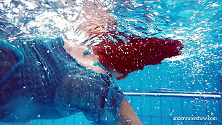 Beautiful ginger hairy pussy underwater