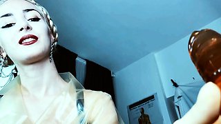 Naughty femdom blonde in stockings uses toy on fetish loser