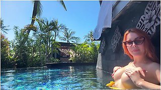 Sexy Redhead Playing In The Pool With Her Tits