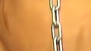Mature Brunette MILF Caned Hard While Chained