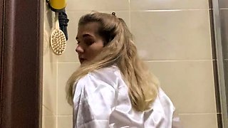 Hot babe with perfect big boobs taking shower