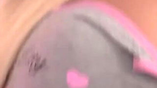 Two Tattooed Chicks Fuck with a Huge Double Ended Dildo