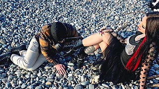 It's wonderful to listen to the sound of the sea while a slave sucks my toes. Dominatrix Nika and her foot slave.