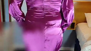 Hot crossdresser in full erotic purple satin