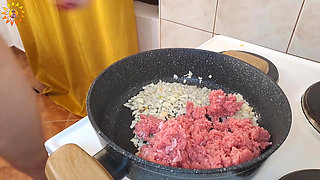 Real Homemade Video: Mila Naturist Cooks Meat with Mushrooms
