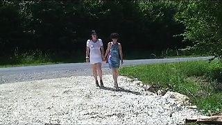 Two gilfs feeling horny in the woods