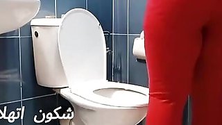 Moroccan Woman Cleaning Toilet