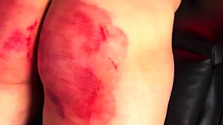 Strafkamer - Mistress Baton - Strapping With Leather