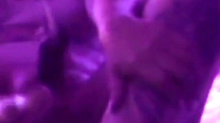 Young Girl Using Her Feet to Play with the Dildo While Masturbating