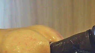 Asian MILF Mistress Inserts Huge Dildo Into Slave Ass