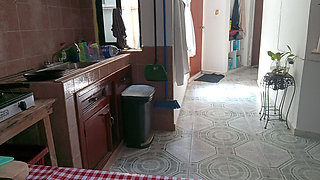 Mom in the kitchen in bralett