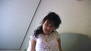 Small titted brunette babe is rubbing her hairy snatch