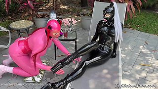 Passionate beauty explores sensual latex foot pleasures