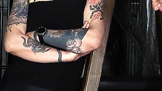 Slave Mila's Feet Dangle and Quiver as Mistress Baton Breaks in Heavy Wooden Paddle Over Her Jeans and Bare