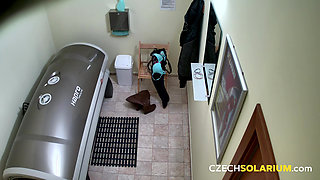 Czech Solarium 61: Busty Redhead Strips Down and Lets It All Hang Out