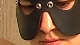 Masked Mature Brunette Bound and Drenched in Cum