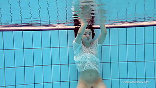 Tight brunette Russian babe Katy Soroka swims