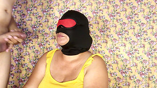 Beautiful mature masked woman giving delicious deep throat blowjob