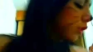 Squirting webcam babe with her cat