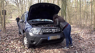 She sucks his cock and he helps her about the car