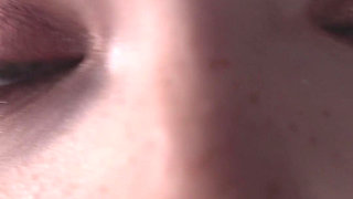 A Girl Is Messing with a Macro Camera