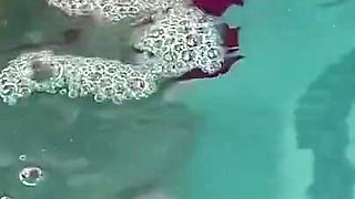 Artemisia Love Sexy and Horny Underwater Showing Her Big Tits in a Super Micro Bikini and You Can See Her Aureolas…