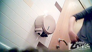 Fantastic slut in black stockings pissing on public toilet