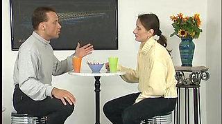 MILF sucks a huge dildo then sits on it having it deep in her pussy