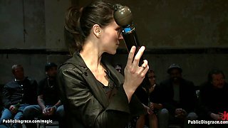 Bound slave sucks big cocks in public
